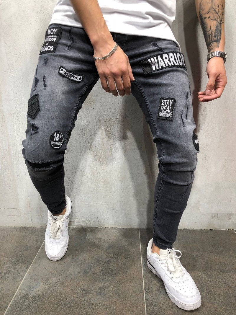 2025 Hot trade denim new men's tight jeans black ripped badge patch small feet denim men's pants