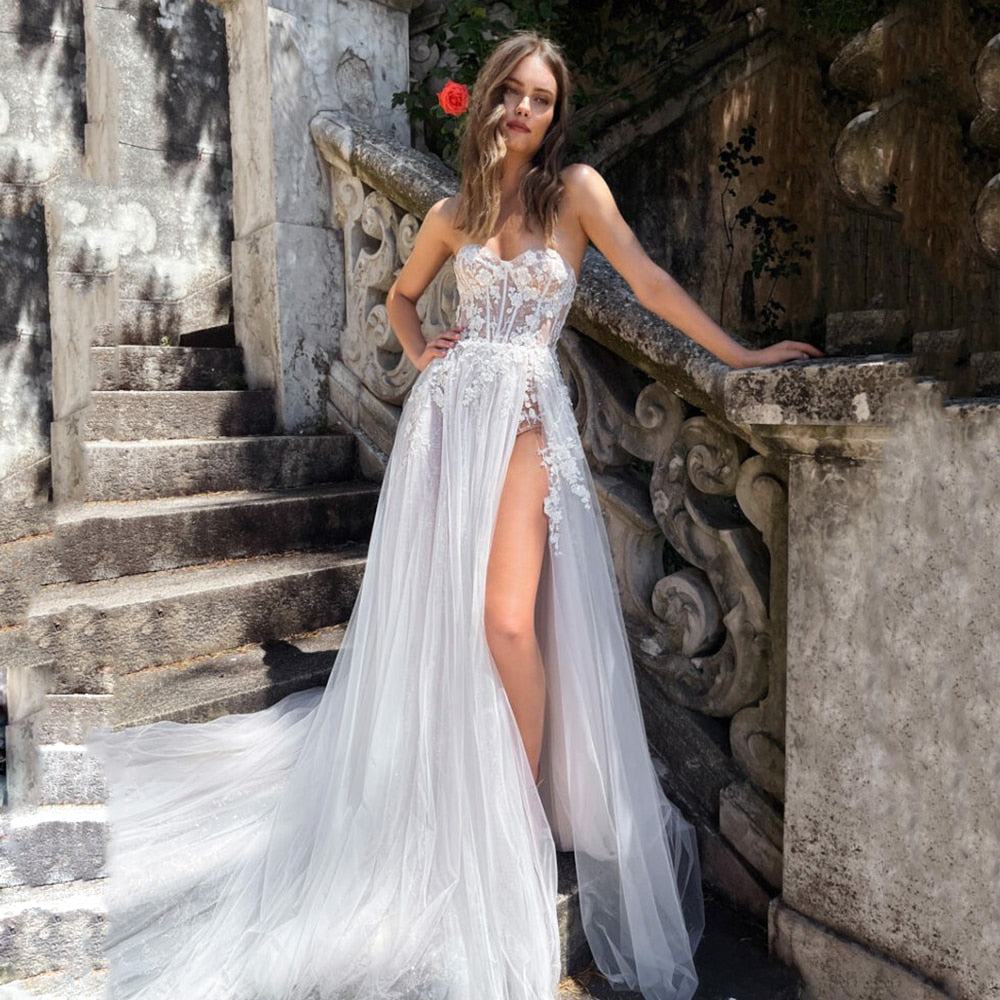 UZN Chic A-Line Lace Appliques Beach Wedding Dresses Sweetheart Sleeveless Bridal Gowns Sexy Brides Dress Robes de mariée