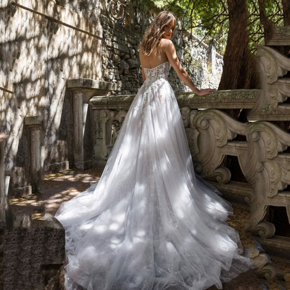 UZN Chic A-Line Lace Appliques Beach Wedding Dresses Sweetheart Sleeveless Bridal Gowns Sexy Brides Dress Robes de mariée