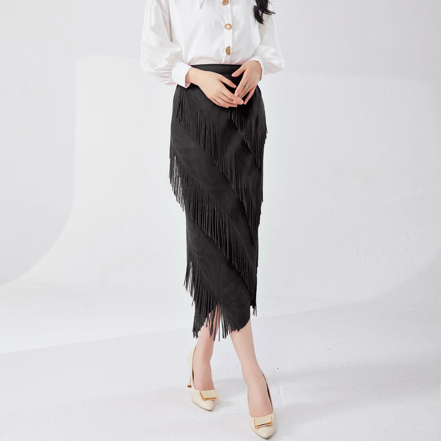 fringed skirt spring and summer high sense irregular medium and long temperament versatile straight hip skirt Popular style