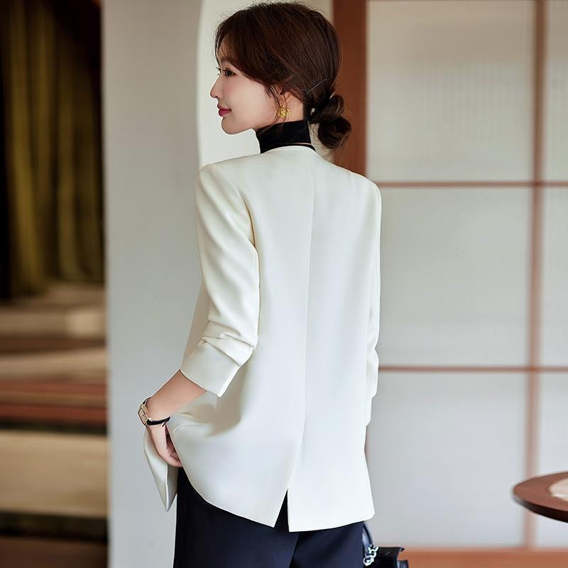 White blazer women's design sense niche 2025 new spring and autumn high-end fried street casual silhouette small suit