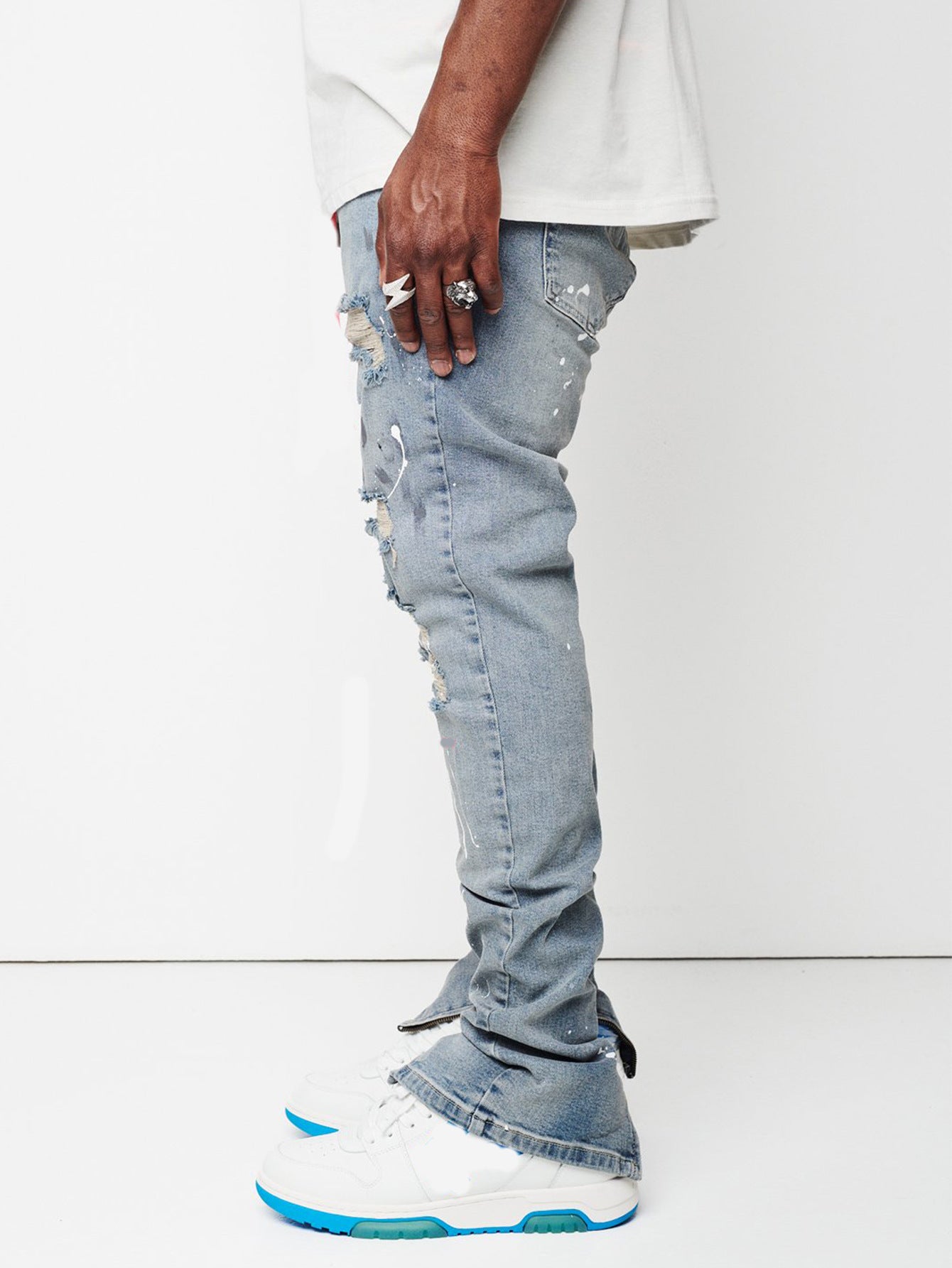 2025 Wish 2025 new men's slim-fitting ripped pants new men's paint jeans factory direct sales