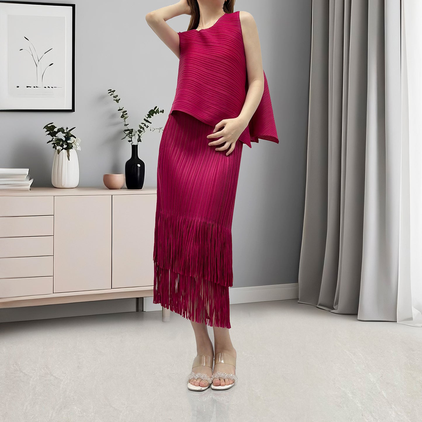 Hot-selling women's clothing with a complete set of temperament irregular sleeveless T-shirt fringed hip skirt two-piece set