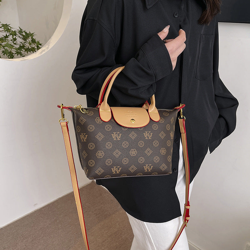 2025 Crossbody bag classic New Longxiang bag retro printed soft leather bag fashion contrasting color commuter handbag women
