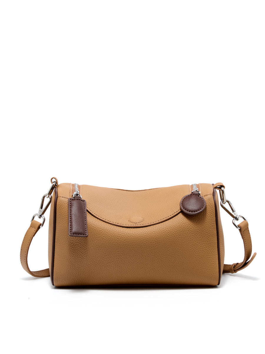 2025 Versatile and simple first-layer cowhide women's bag, genuine leather Boston bag, shoulder messenger bag, textured pillow bag.