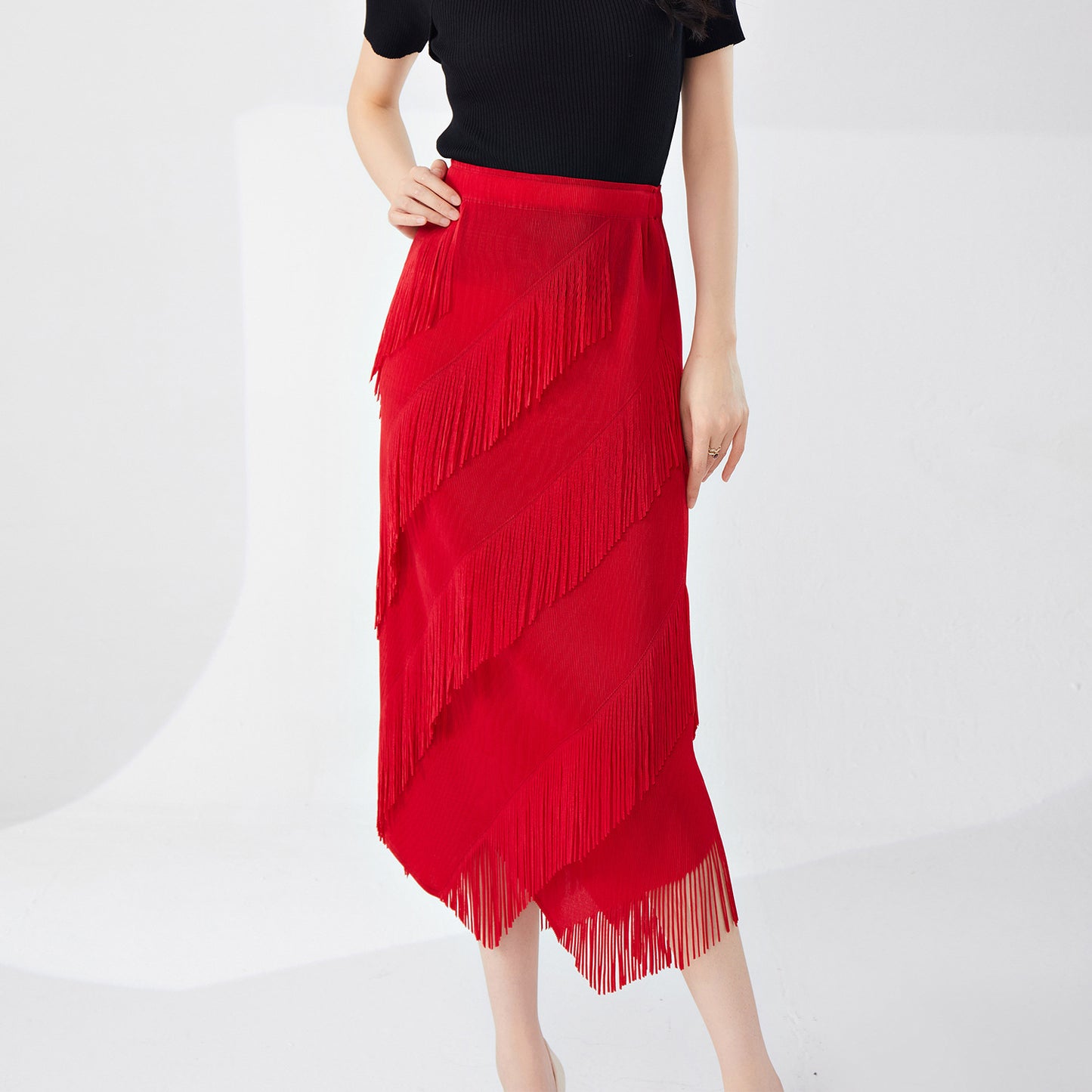 fringed skirt spring and summer high sense irregular medium and long temperament versatile straight hip skirt Popular style