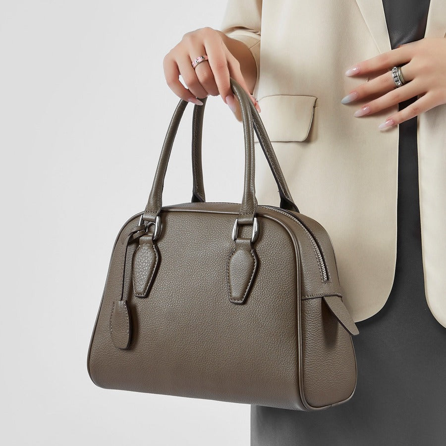 2025 Premium leather popular new women's bag large capacity first layer cowhide handbag Boston bowling pillow bag