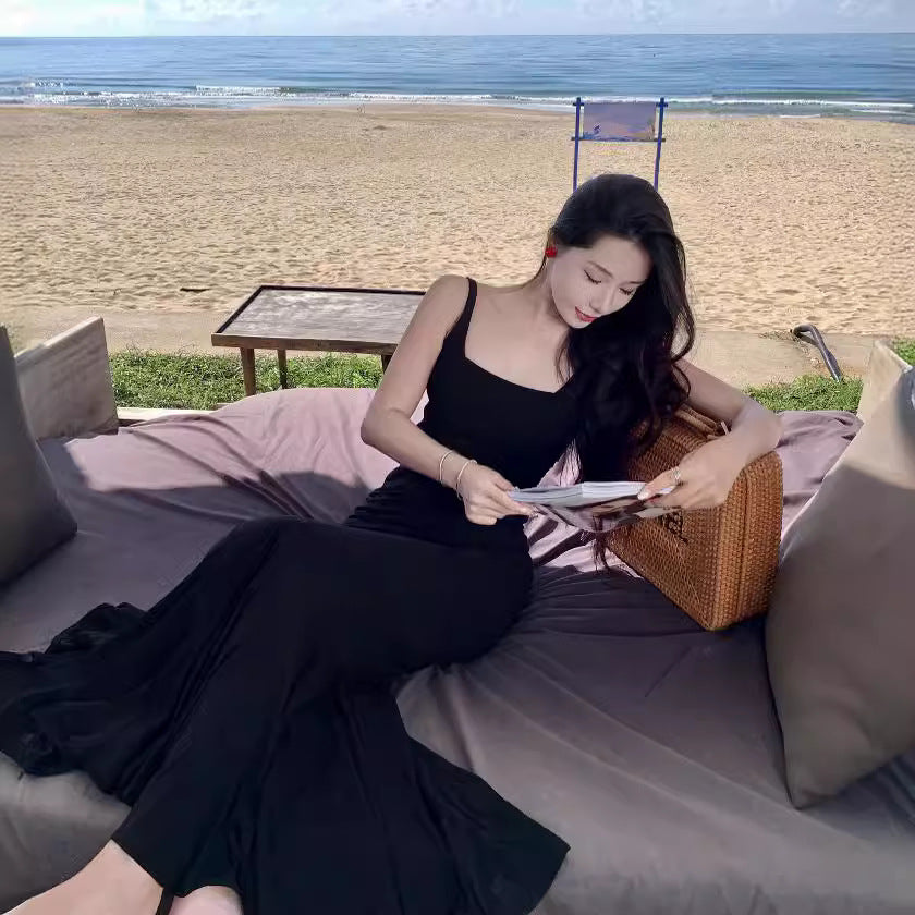 2025 seaside vacation light luxury black suspender dress summer new design temperament knitted fishtail dress