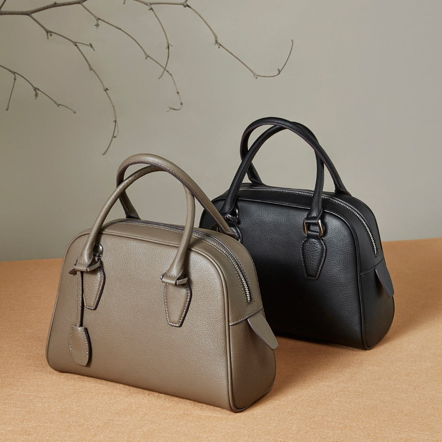 2025 Premium leather popular new women's bag large capacity first layer cowhide handbag Boston bowling pillow bag