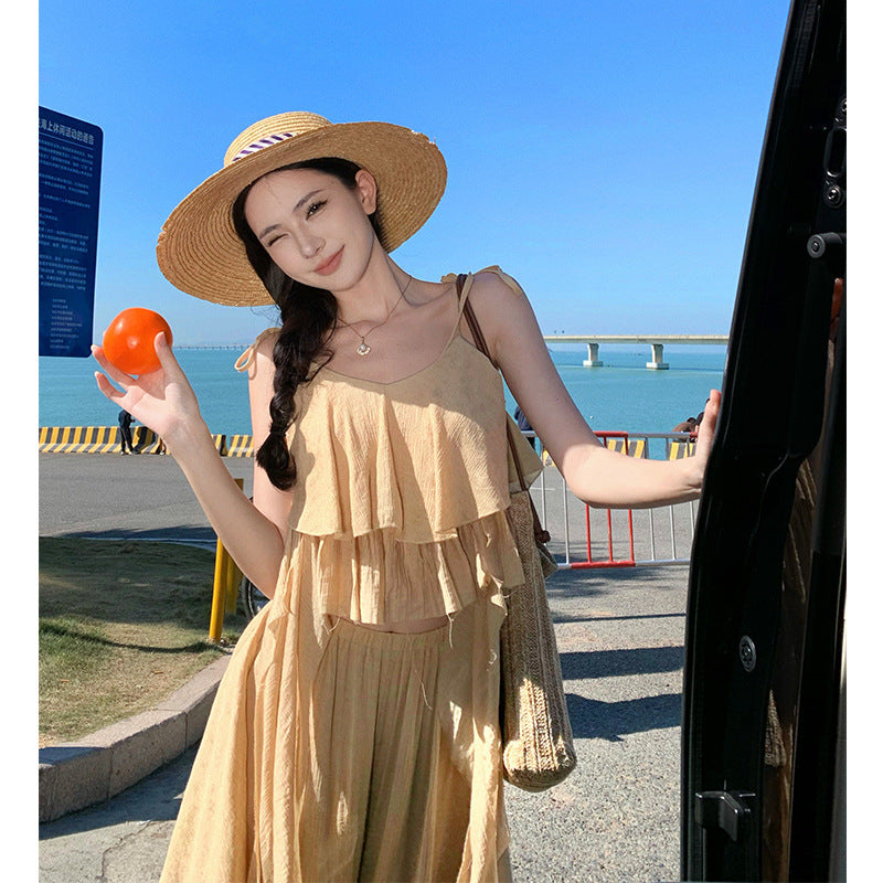 2025 Niche design seaside vacation suit wear women's summer lotus leaf edge streamer vest loose wide-leg pants two-piece set