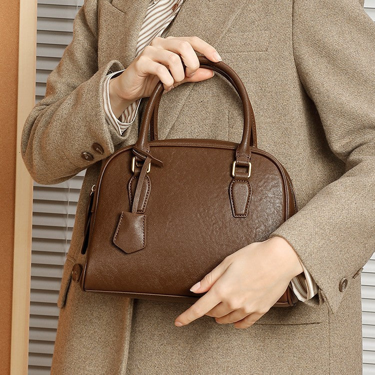 2025 The first layer of cowhide versatile women's bag popular new Boston pillow bag shoulder messenger bag