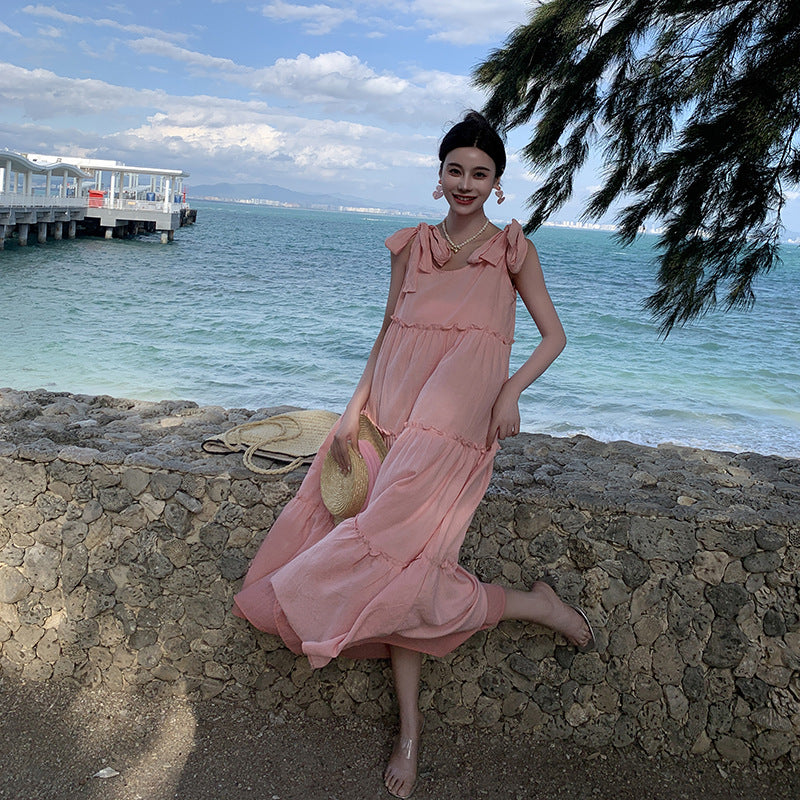 2025 Sweet pink strap dress women's summer Hainan Sanya beach skirt lazy wind loose pendant suspender dress