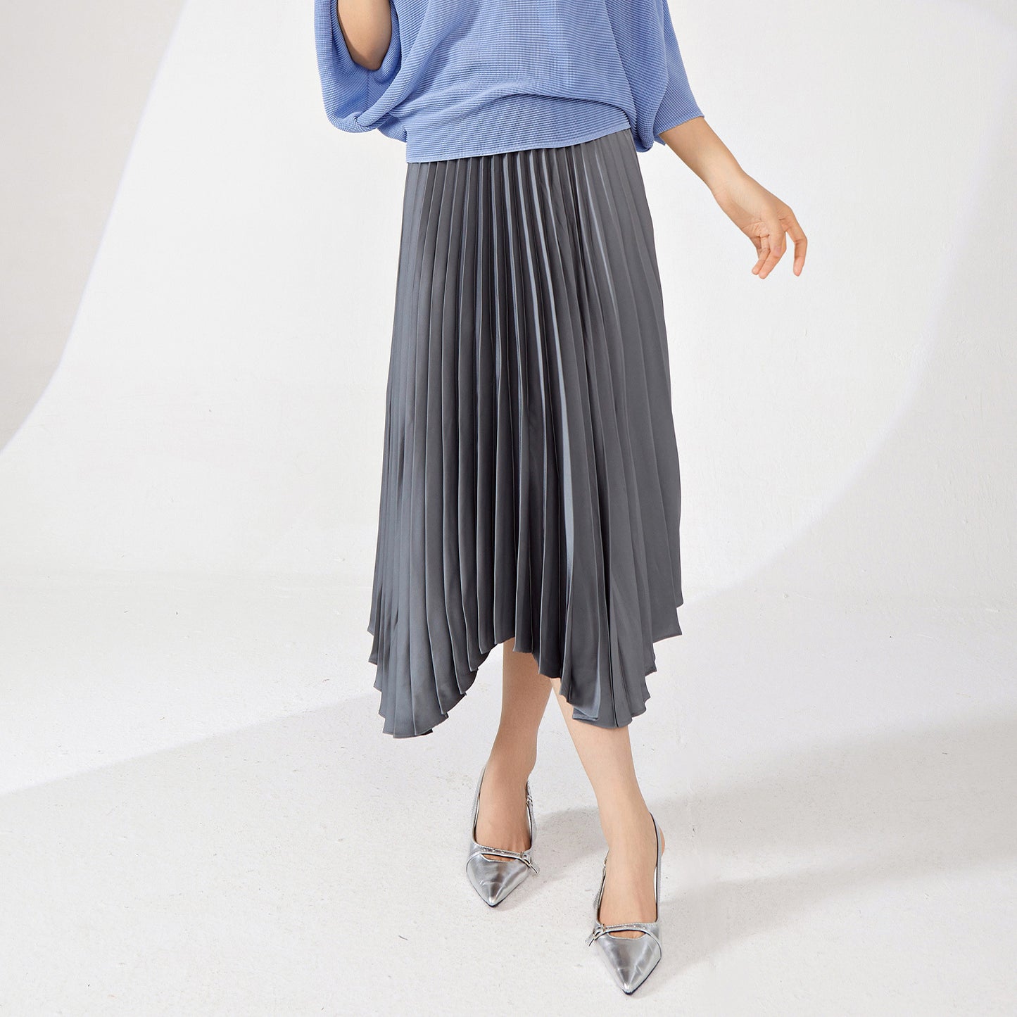 fashion pleated skirt women's high sense solid color loose pendulum irregular versatile skirt a word women's drape