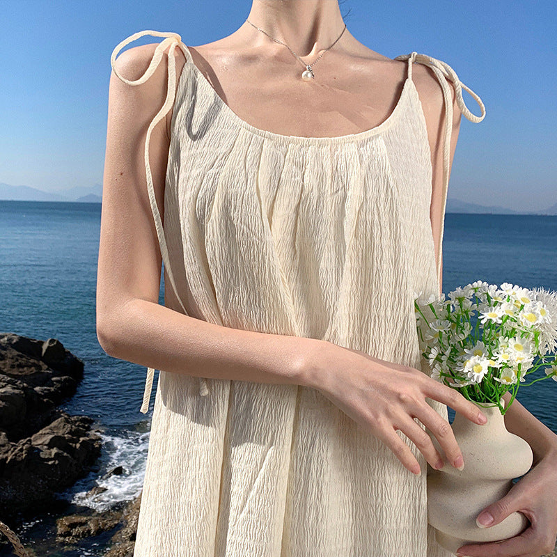 2025 Super good-looking casual vacation suspender dress women's summer temperament texture dark pattern loose backless long skirt