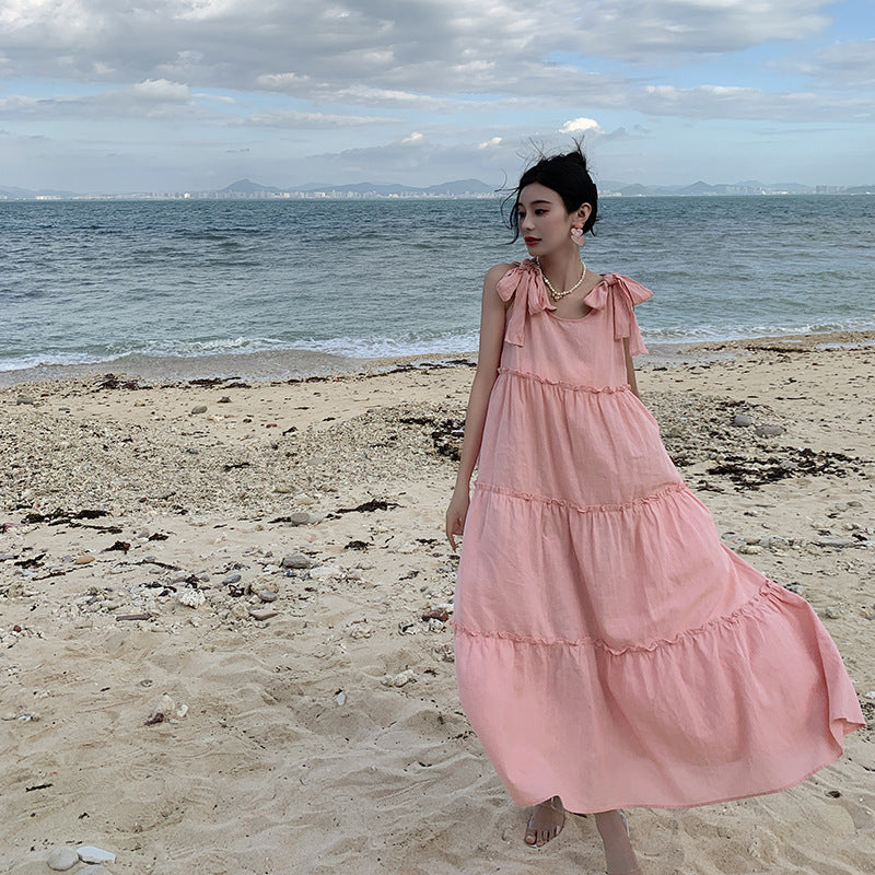 2025 Sweet pink strap dress women's summer Hainan Sanya beach skirt lazy wind loose pendant suspender dress