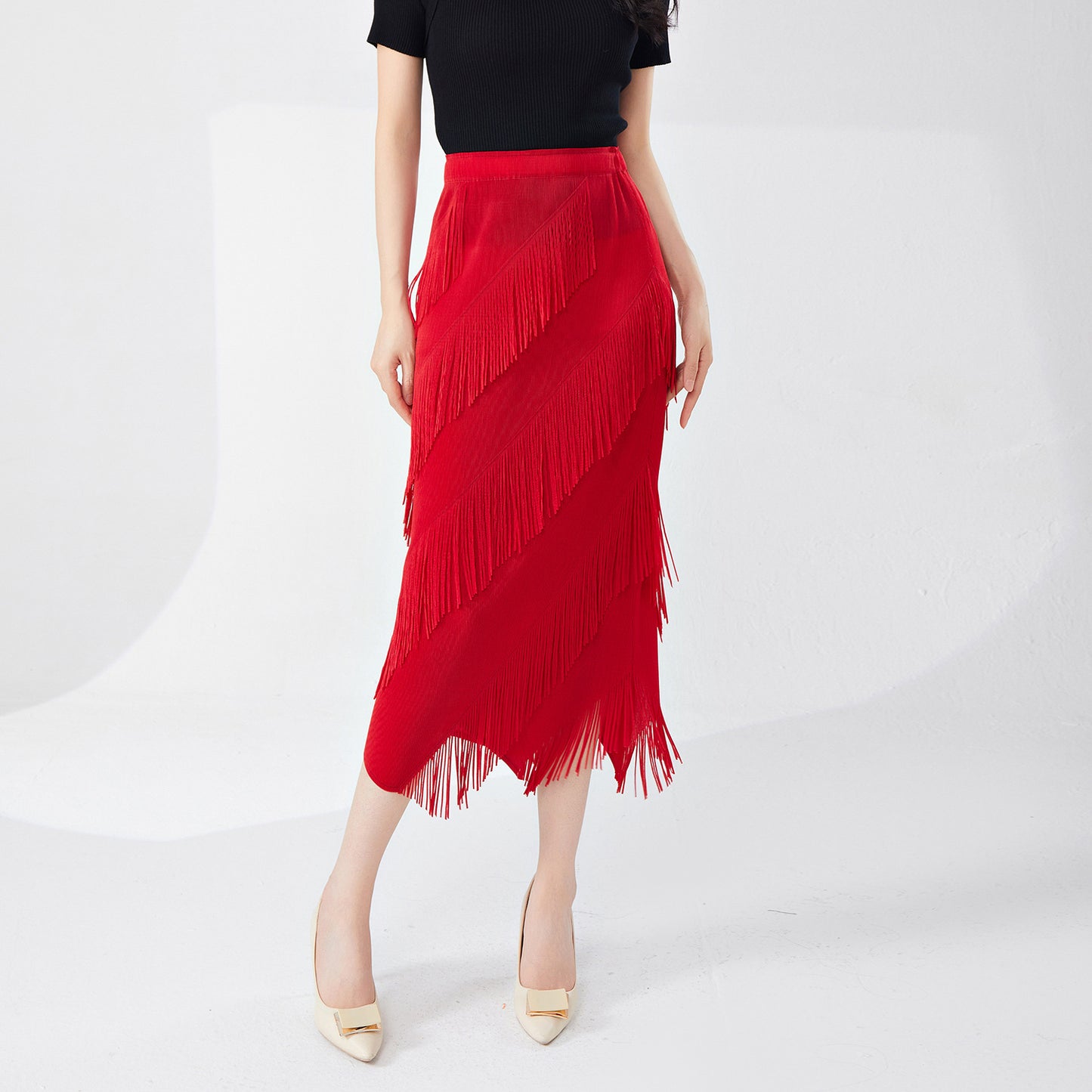 fringed skirt spring and summer high sense irregular medium and long temperament versatile straight hip skirt Popular style