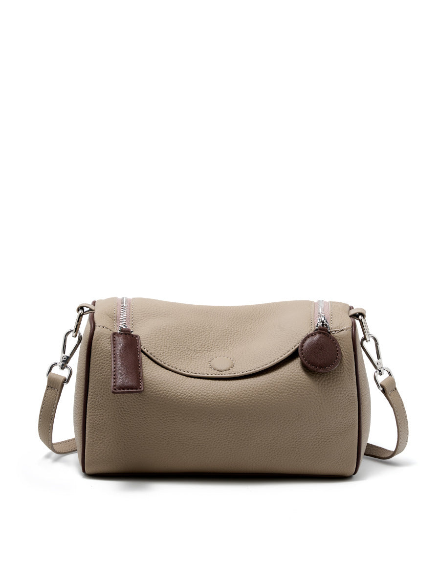 2025 Versatile and simple first-layer cowhide women's bag, genuine leather Boston bag, shoulder messenger bag, textured pillow bag.