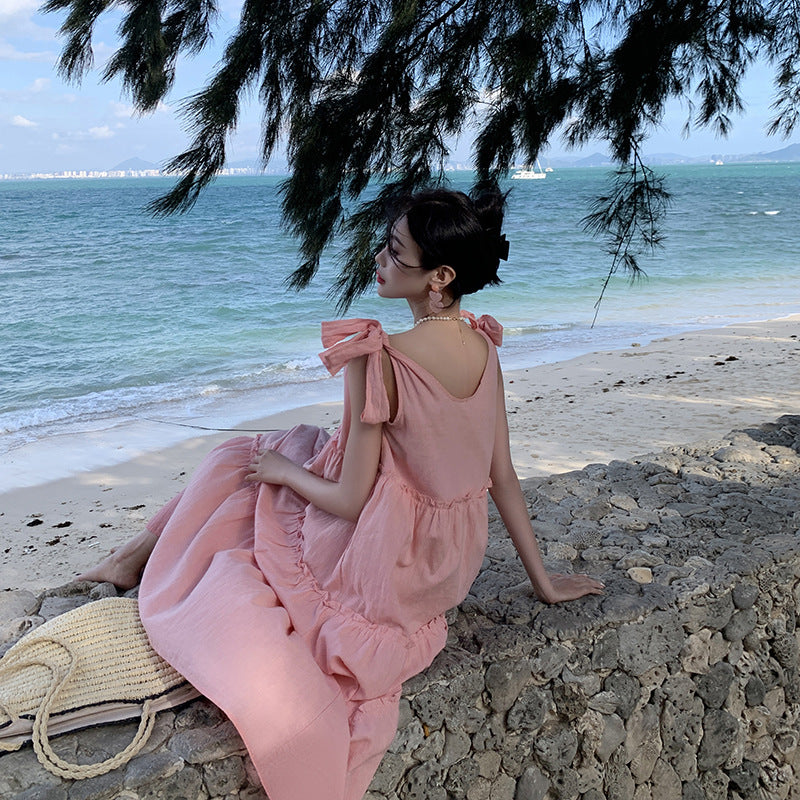 2025 Sweet pink strap dress women's summer Hainan Sanya beach skirt lazy wind loose pendant suspender dress