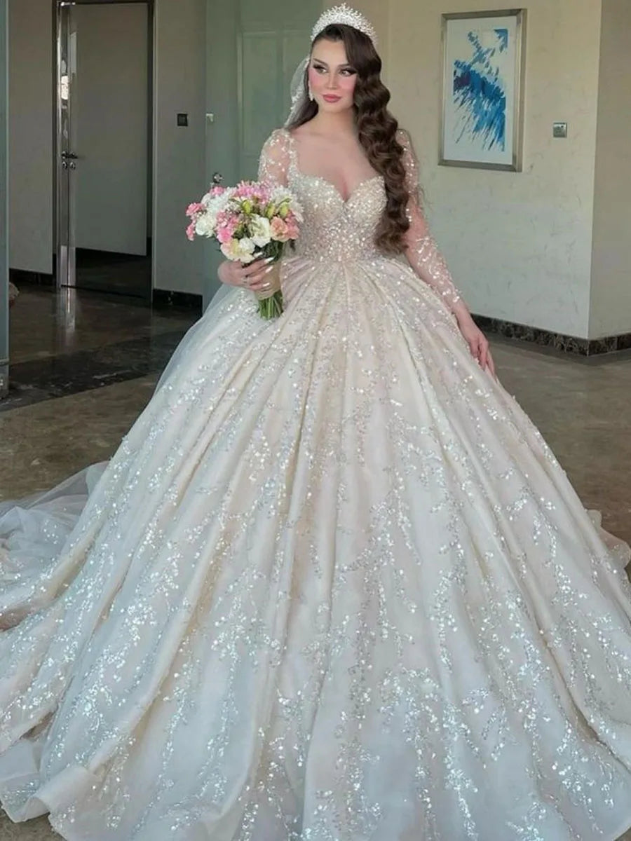 qgtao Luxury Long Sleeve Dubai Wedding Dress Ball Gown Plus Size Sequined Beading Illusion Saudi Arabic Sweetheart Bridal Gown