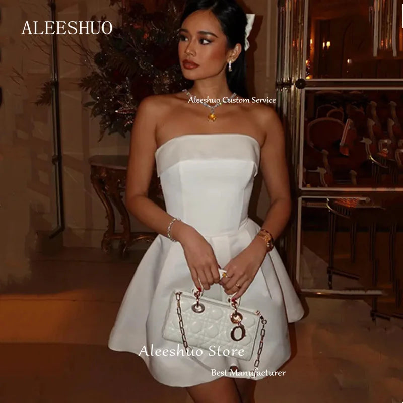 qgtao Sexy White Mini A-Line Prom Dressess Sleeveless Pleat Short Evening Dress Strapless Backless Lace Up Formal Dress 2024