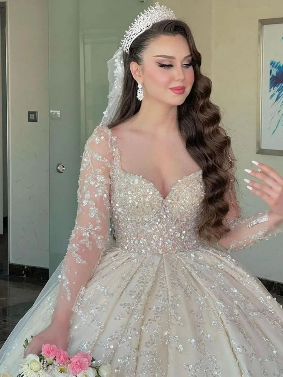qgtao Luxury Long Sleeve Dubai Wedding Dress Ball Gown Plus Size Sequined Beading Illusion Saudi Arabic Sweetheart Bridal Gown