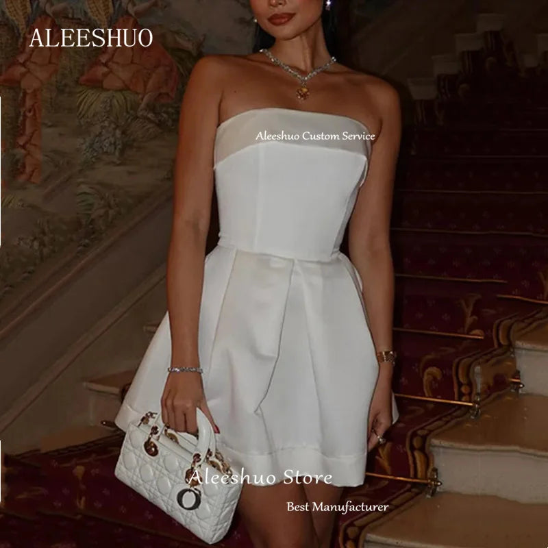 qgtao Sexy White Mini A-Line Prom Dressess Sleeveless Pleat Short Evening Dress Strapless Backless Lace Up Formal Dress 2024