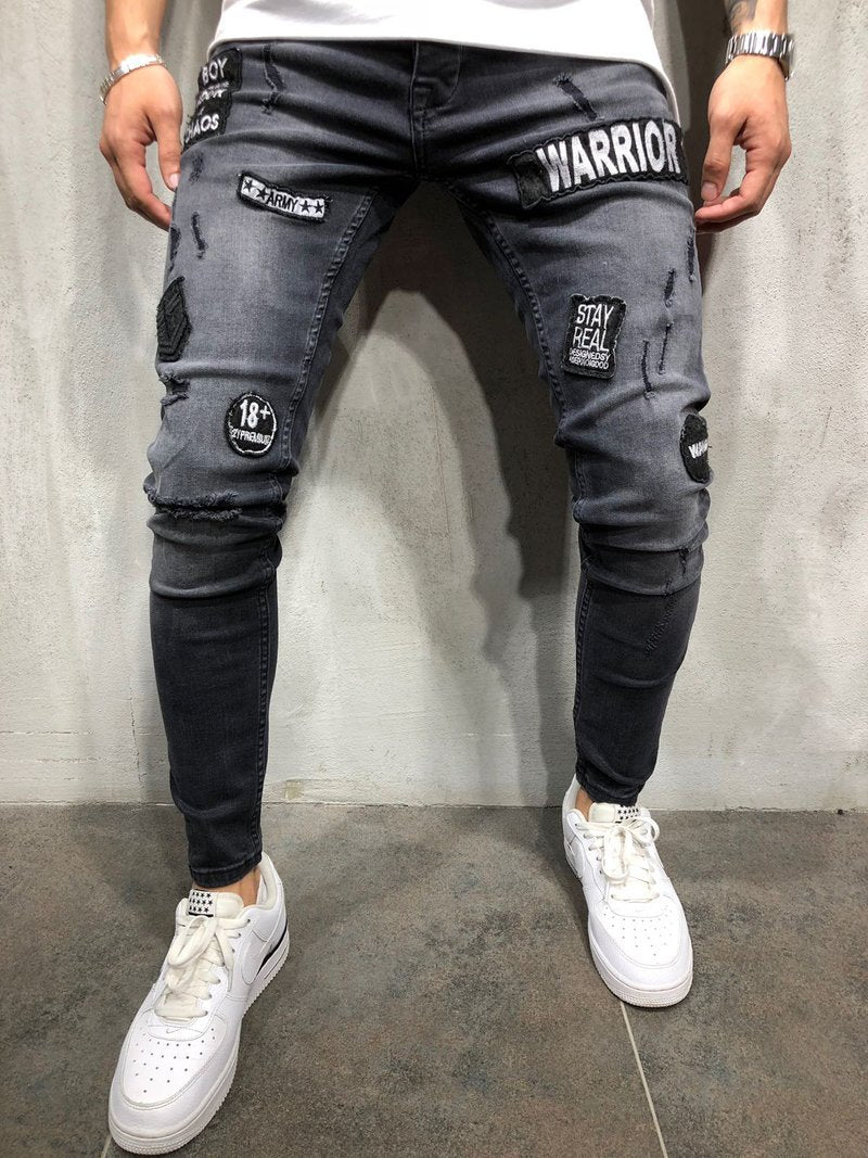 2025 Hot trade  denim new men's tight jeans black ripped badge patch small feet denim men's pants