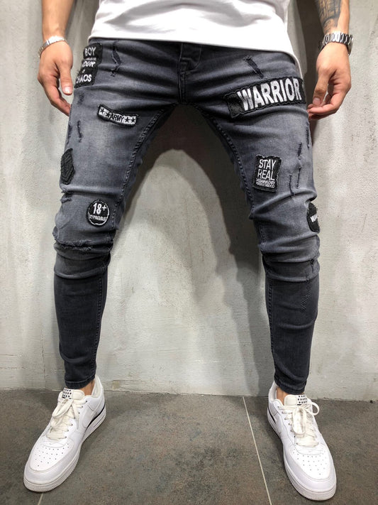 2025 Hot trade  denim new men's tight jeans black ripped badge patch small feet denim men's pants
