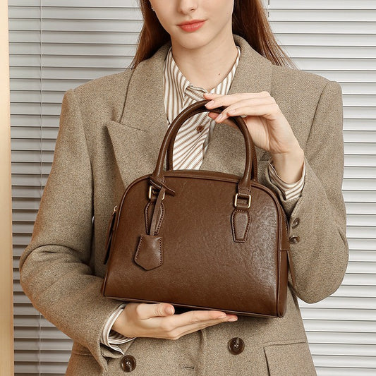 2025 The first layer of cowhide versatile women's bag popular new Boston pillow bag shoulder messenger bag