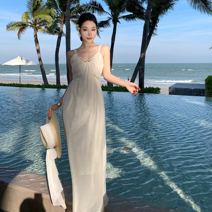 2025 Super fairy seaside vacation style design sense hollow sleeveless suspender dress summer new slim and thin skirt