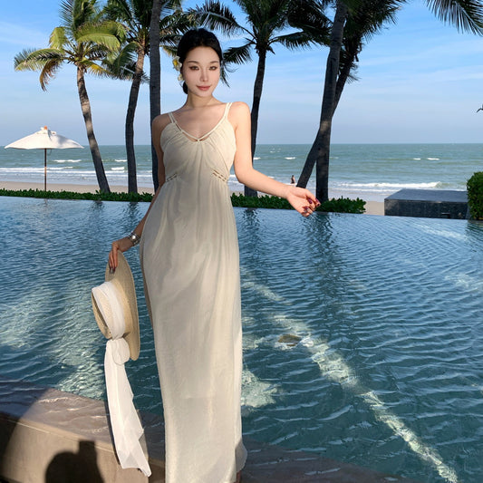 2025 Super fairy seaside vacation style design sense hollow sleeveless suspender dress summer new slim and thin skirt