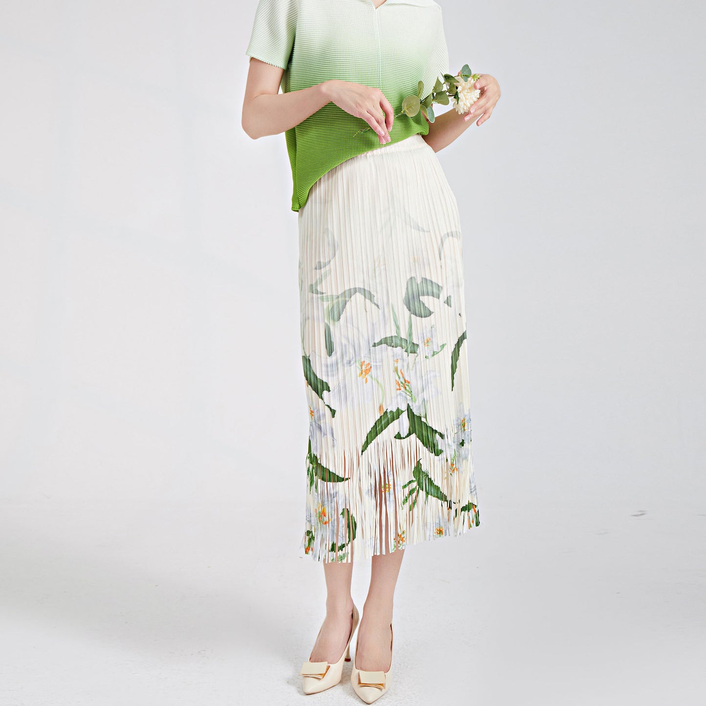 recommends a fringed skirt for women's summer new elastic waist printed commuter versatile pleated hip skirt