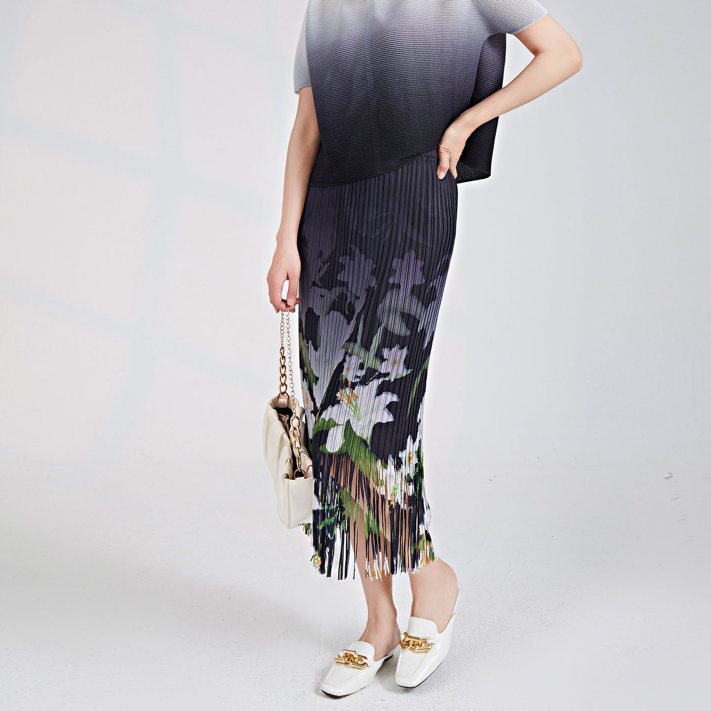 recommends a fringed skirt for women's summer new elastic waist printed commuter versatile pleated hip skirt