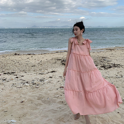 2025 Sweet pink strap dress women's summer Hainan Sanya beach skirt lazy wind loose pendant suspender dress