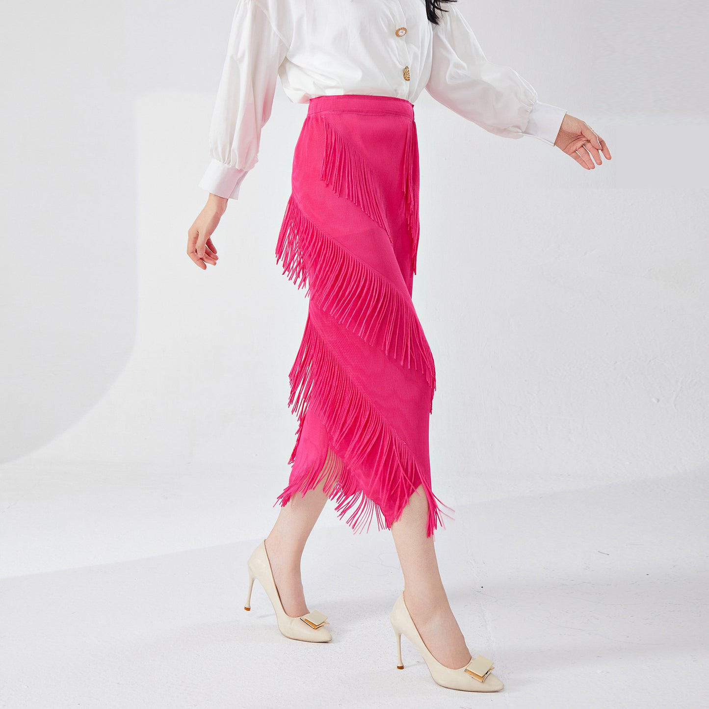 fringed skirt spring and summer high sense irregular medium and long temperament versatile straight hip skirt Popular style
