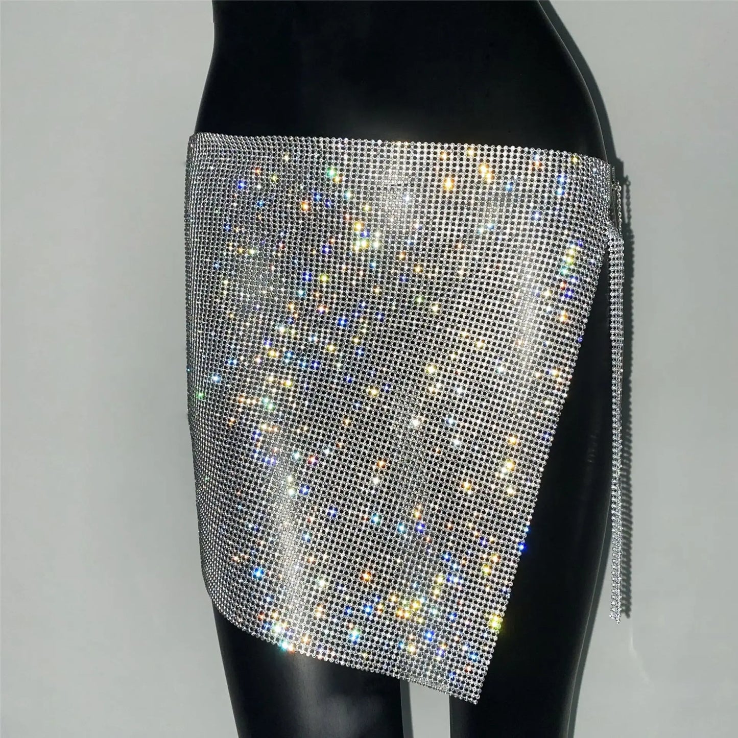 qgtao Glitter Rhinestone Metal Chain Mini Skirt for Women Sexy Side Slit See Through Party Skirt Rave Festival Outfits