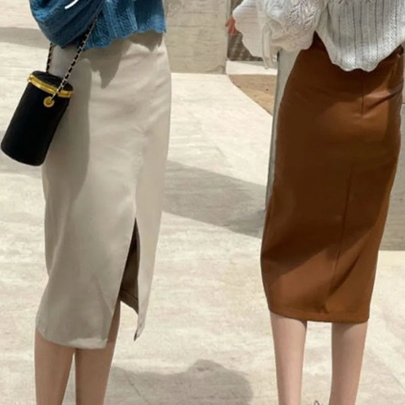 Simplicity Commute Solid Color Temperament Leather Skirts for Women Slim High Waist Split Sexy Bag Hip Skirts Female Clothing